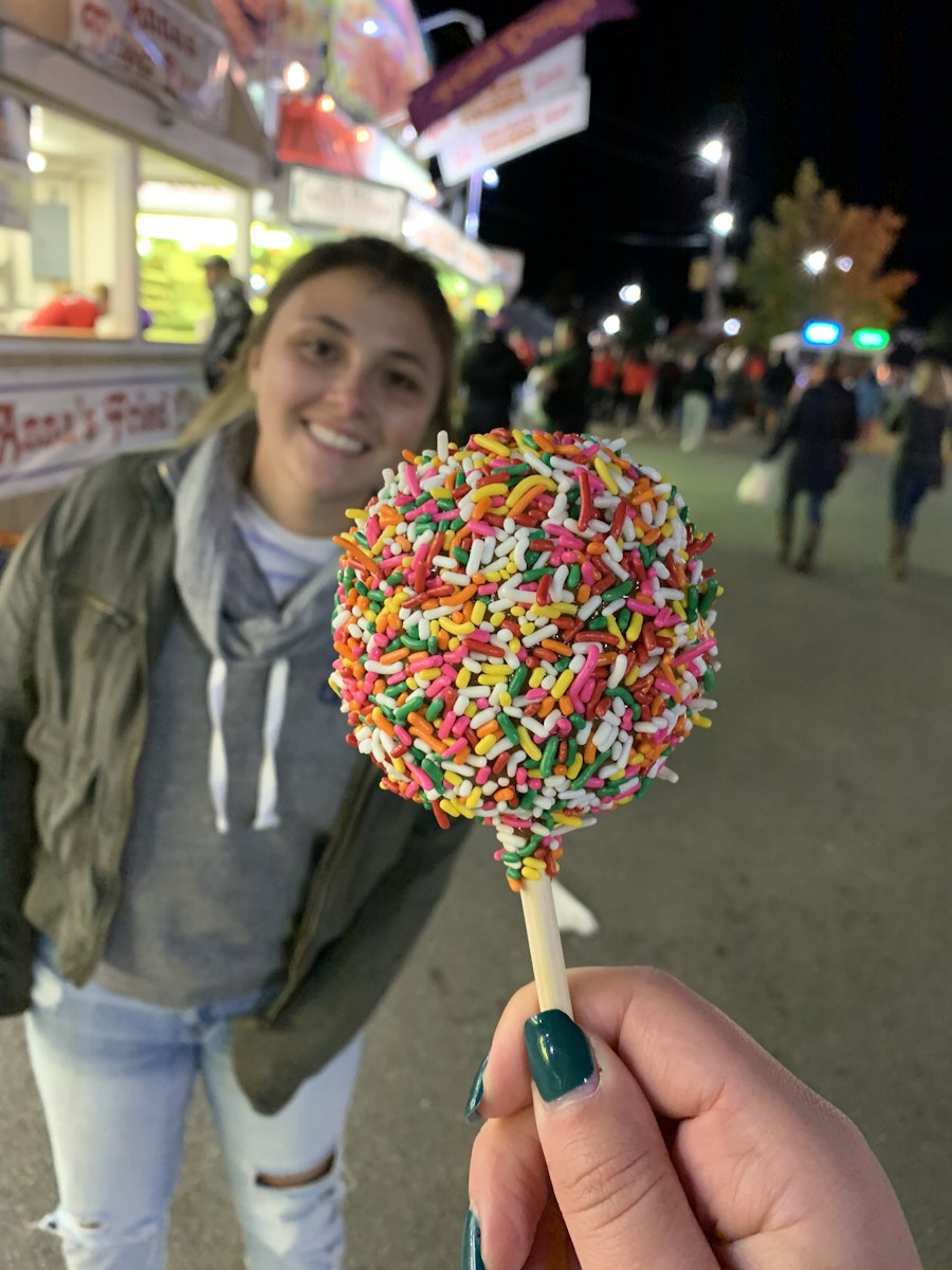 Enjoying a candy apple at the Topsfield fair